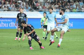 Jogadores do Manchester City comemoram um dos gols sobre o combinado da K league –