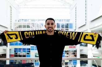 Santi chegou sorridente aos Estados Unidos –