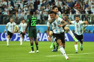 Rojo e Messi celebram gol da Argentina