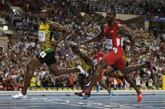 <p>Bolt supera Gatlin nos 100 m em Moscou</p>