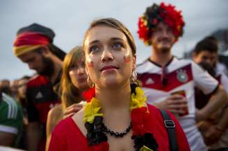 <p>Torcedores da Alemanha e da Argélia sofrem, gritam e vibram na Fifa Fan Fest montada nas areias de Copacabana</p>