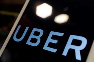 Logo do Uber em iPad durante coletiva de imprensa da empresa
13/04/2017 REUTERS/Tyrone Siu