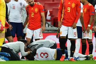 Jogador sofreu uma grande pancada na cabeça (Foto:AFP)