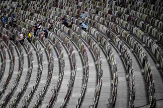 Estádio Nacional de Tóquio chegou a receber eventos-testes com público (Foto: CHARLY TRIBALLEAU / AFP)