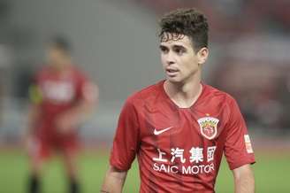 Oscar tem acordo com o Flamengo e aguarda liberação oficial do Shanghai Port FC (Foto: STR / AFP)