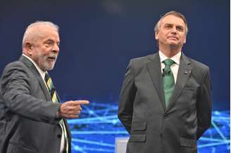 Lula e Bolsonaro durante debate na Band