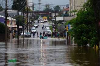 PASSO FUNDO RS - 04-09-2023 CICLONE CHUVAS-FORTES-CAUSAM-MORTES,-ESTRAGOS-ENCHENTES - GERAL - Chuvas fortes causam mortes, estragos, enchente e deixa centenas de pessoas desabrigadas. No Bairro Entre-Rios, o Rio Passo Fundo subiu deixando diversas casas embaixo d'agua e pessoas e animais tendo que serem resgata FOTO PREFEITURA DE PASSO FUNDO