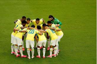 Seleção brasileira durante jogo contra a Escócia na fase de grupos