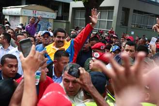<p>Maduro assumiu interinamente a presidência da Venezuela até a realização de eleições</p>