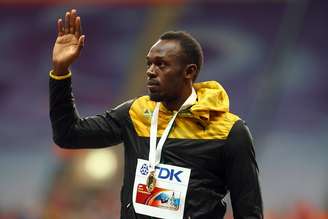 <p>O jamaicano Usain Bolt recebeu nesta segunda-feira a medalha de ouro dos 100 m rasos do Mundial de Atletismo de Moscou</p>