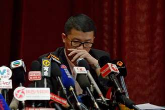 <p>Ignatius Ong, membro da equipe de gerenciamento de crise da Malaysia Airlines, reage enquanto responde a uma pergunta numa conferência de imprensa em Pequim, neste domingo, 9 de março</p>