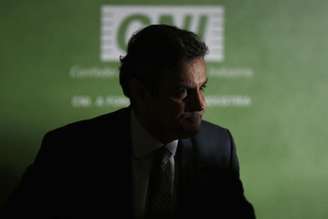 Candidato do PSDB à Presidência, Aécio Neves, durante entrevista coletiva na sede da CNI em Brasília. 30/07/2014.