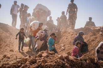 Refugiados sírios são vistos na Jordânia após fugirem de seu país por conflitos