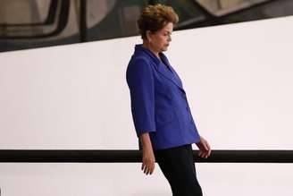 A presidente, Dilma Rousseff, chegando à cerimônica de lançamento do pacote anticorrupção. 18/03/2015