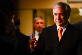 O vice-presidente Michel Temer, após reunião com a presidenta Dilma Rousseff, no Palácio do Planalto.