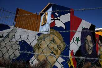 Muro pintado no México com o rosto de Donald Trump