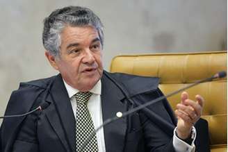 O ministro Marco Aurélio Mello acredita que, a princípio, cabe ao Senado também analisar se confirma ou não o recolhimento domiciliar noturno, medida contra o senador também imposta no julgamento de ontem