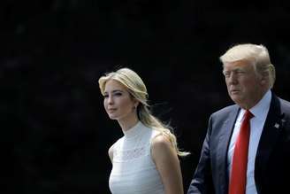 FILE PHOTO: U.S. President Donald Trump and his daughter Ivanka Trump walk on the South Lawn of the White House in Washington, DC, U.S., before their departure to Milwaukee, Wisconsin, June 13, 2017.  REUTERS/Carlos Barria/File Photo