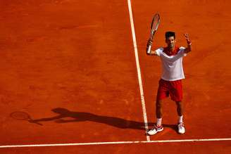 O sérvio Novak Djokovic comemorou após sua partida contra o conterrâneo Dusan Lajovic durante o segundo dia da Série ATP Masters, em Monte Carlo, Mônaco.