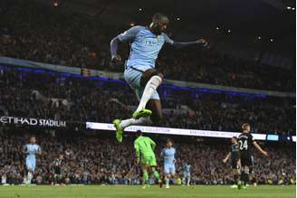 Yaya Touré faturou três títulos do Campeonato Inglês com o City (Foto: ANTHONY DEVLIN / AFP)