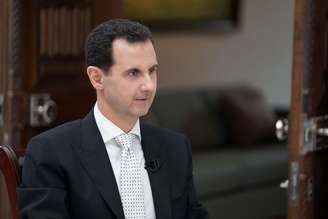O presidente sírio, Bashar al-Assad, durante entrevista com jornal grego em Damasco, na Síria
10/05/2018
Sana/Divulgação via Reuters

