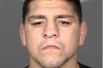Foto divulgada pela polícia de Las Vegas de Nick na prisão após acusação de violência doméstica (Foto: Divulgação)