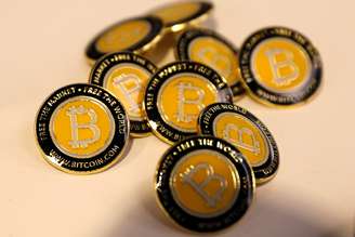 Botões do Bitcoin.com são exibidos na conferência de tecnologia blockchain do Consensus 2018 em Nova York 16/05/ 2018. REUTERS/Mike Segar 