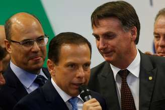 Governador eleito de São Paulo João Doria (PSDB), entre o presidente eleito Jair Bolsonaro (PSL) e o governador eleito do Rio de Janeiro Wilson Witzel (PSC)
14/11/2018
REUTERS/Adriano Machado