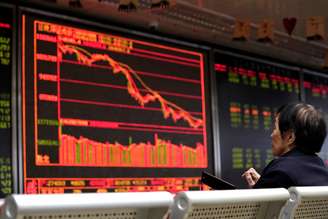 Investidor observa painel de ações em Pequim, China
08/10/2018
REUTERS/Jason Lee