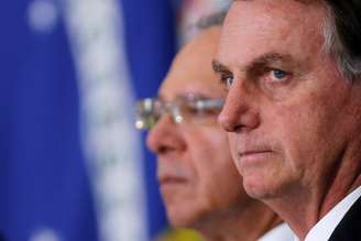 Presidente Bolsonaro e ministro Paulo Guedes durante evento no Planalto 15/10/2019 REUTERS/Adriano Machado