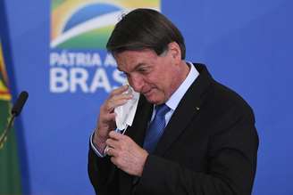 O presidente da República, Jair Bolsonaro, durante a cerimônia de prorrogação do auxílio emergencial a trabalhadores informais, no Palácio do Planalto