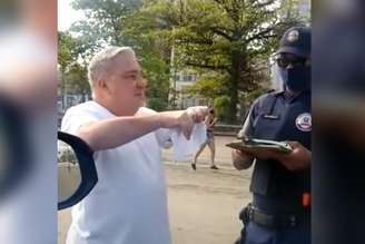 Sem máscara, desembargador é multado e ofende guarda em Santos/SP