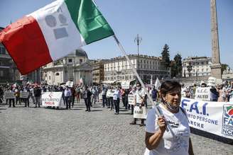 Protesto de trabalhadores do setor de turismo em Roma, capital da Itália, em junho passado