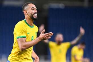 Matheus Cunha saiu de campo logo após fazer o gol do triunfo brasileiro (CHARLY TRIBALLEAU / AFP