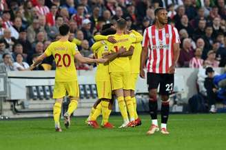 Com o empate, o Liverpool se manteve na liderança do Campeonato Inglês com 14 pontos nos seis primeiros jogos (Foto: GLYN KIRK / AFP)