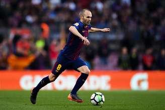 Iniesta pelo Barcelona. 