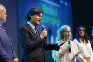 Leonardo Sica e Patricia Vanzolini, durante a conferência em Ribeirão Preto