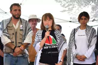  Greta Thunberg ao lado do brasileiro Thiago Ávila em Catânia, na Itália