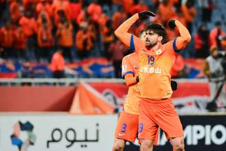 Zeca comemora gol pelo Shandong Taishan