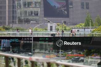Telão com cotações acionárias em Xangai
11/04/2025. REUTERS/Go Nakamura  