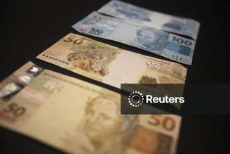 Notas de real
13/12/2010. REUTERS/Ricardo Moraes