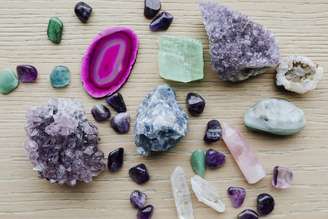 Colorful healing crystals on a wooden table