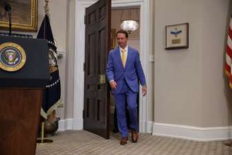 Presidente dos EUA, Donald Trump, discursa ao lado do governador da Louisiana, Jeff Landry, na Casa Branca
 24/03/2025 
REUTERS/Carlos Barria