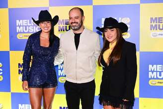 Ana Castela, Iuri Maia, do Mercado Livre, e Lauana Prado no anúncio da terceira edição do Meli Music