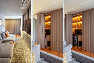 O bar embutido na marcenaria torna a sala de TV mais acolhedora e funcional (Projeto: Cristiane Schiavoni | Imagens: Carlos Piratininga)