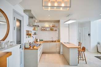 A cozinha se consolida como um espaço de convivência e conforto dentro de casa