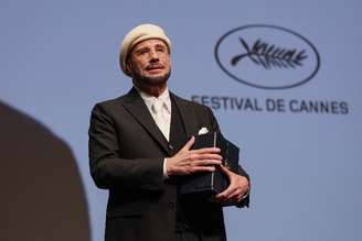 O diretor John Travolta no palco para a exibição de seu filme "Propeller One-Way Night Coach" no 79º Festival de Cinema de Cannes
15 de maio de 2026
REUTERS/Gonzalo Fuentes
