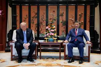 Presidente chinês Xi Jinping e o presidente dos EUA Donald Trump em Pequim
 15 de maio de 2026    REUTERS/Evan Vucci