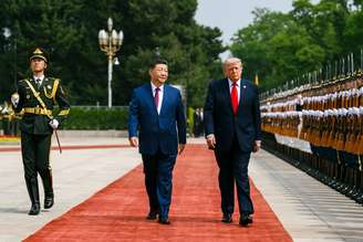 Trump e Xi Jinping durante encontro em Pequim