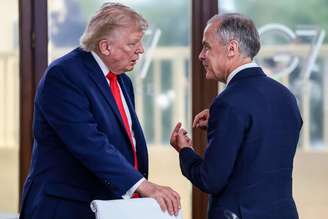 Donald Trump e Mark Carney durante cúpula do G7 na França, em junho de 2026